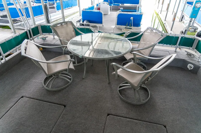 Slide: The Image of Outdoor seating area on 1995 Lakeview 62 x 14 Widebody Houseboat deck. - 9