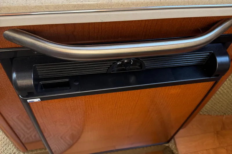 Slide: The Image of Stainless steel handle on 2012 Sea Ray 280 Sundancer's wooden cabinet door. - 19