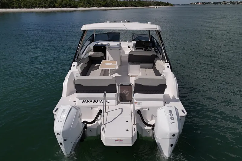 Slide: The Image of Aquila 32 Sport 2025 boat on calm water near Sarasota, Florida. - 3