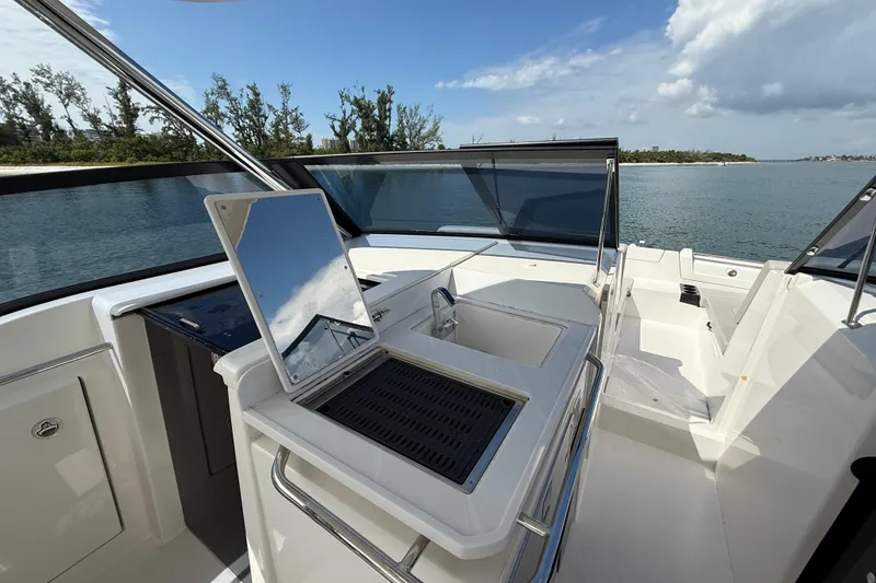 Slide: The Image of 2025 Aquila 32 Sport yacht interior with sleek design and modern amenities. - 34