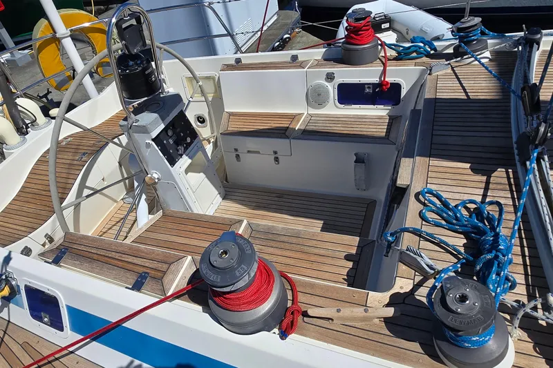 Slide: The Image of Luxurious cabin interior of 1985 Swan 46 yacht with cozy bedding and ambient lighting. - 32