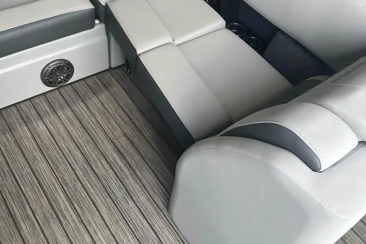 Slide: The Image of Interior of 2020 Harris Solstice 250 boat with gray seating and striped flooring. - 10