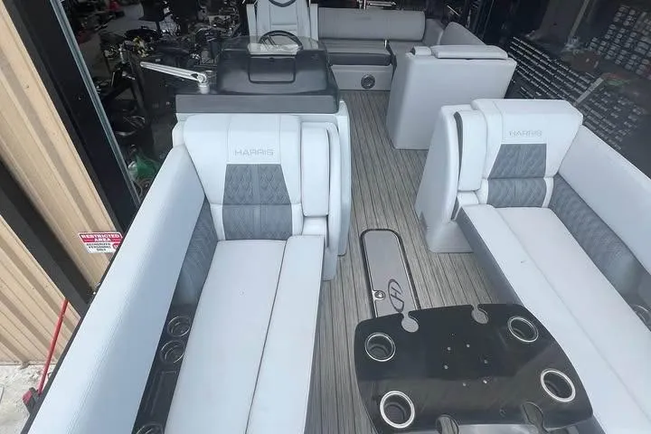 Slide: The Image of 2020 Harris Solstice 250 boat interior with luxurious seating and modern design. - 15