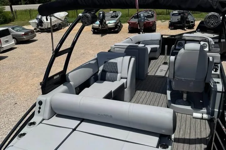 Slide: The Image of 2020 Harris Solstice 250 pontoon boat with luxurious seating and modern design. - 16