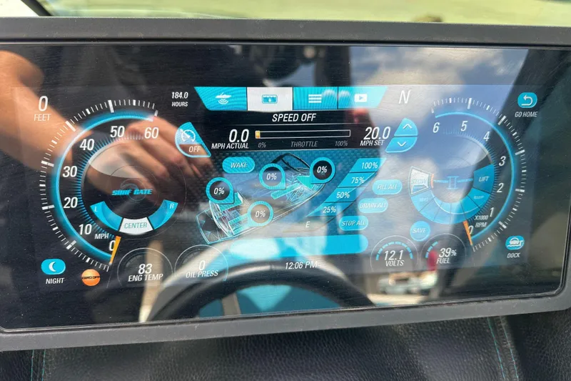 Slide: The Image of Dashboard of a 2018 Malibu Wakesetter 23 LSV boat, displaying speed and engine metrics. - 16