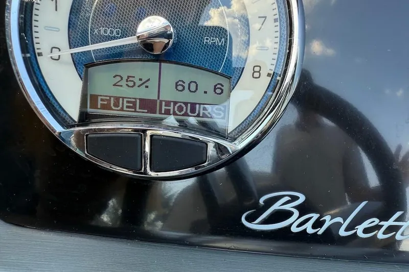 Slide: The Image of Dashboard of 2021 Barletta L23UC showing 25% fuel and 60.6 hours. - 10