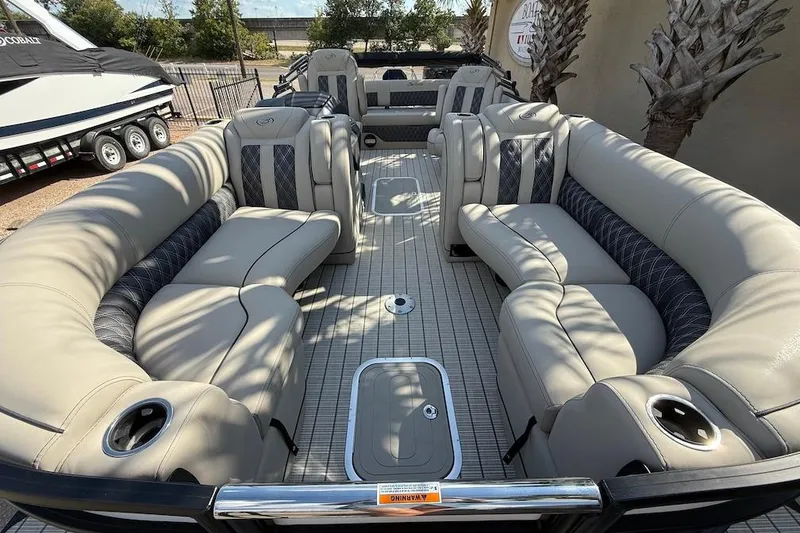 Slide: The Image of Luxurious 2021 Barletta L23UC pontoon boat with spacious seating and elegant design. - 6