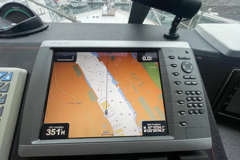 Slide: The Image of Garmin GPS display on 1989 Bayliner Pilothouse 4588, showing nautical navigation map. - 24