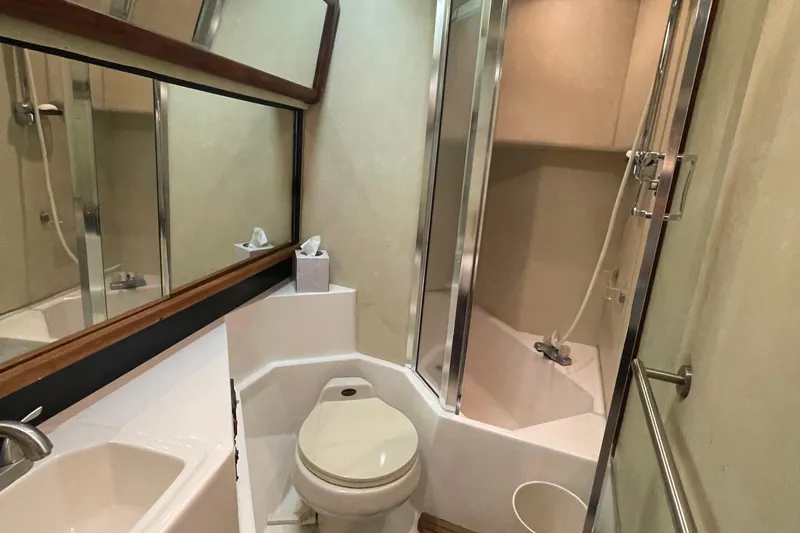 Slide: The Image of Bathroom interior of 1989 Bayliner Pilothouse 4588 with shower and toilet. - 40
