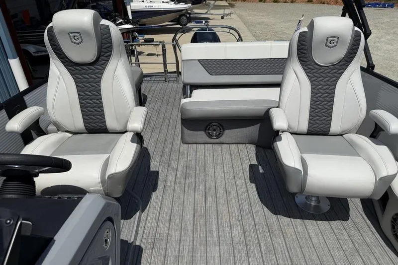 Slide: The Image of Interior of 2021 Godfrey Monaco 235 SFL GTP boat with luxurious seating. - 11