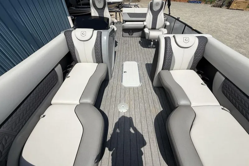Slide: The Image of 2021 Godfrey Monaco 235 SFL GTP boat interior with luxurious seating and modern design. - 21