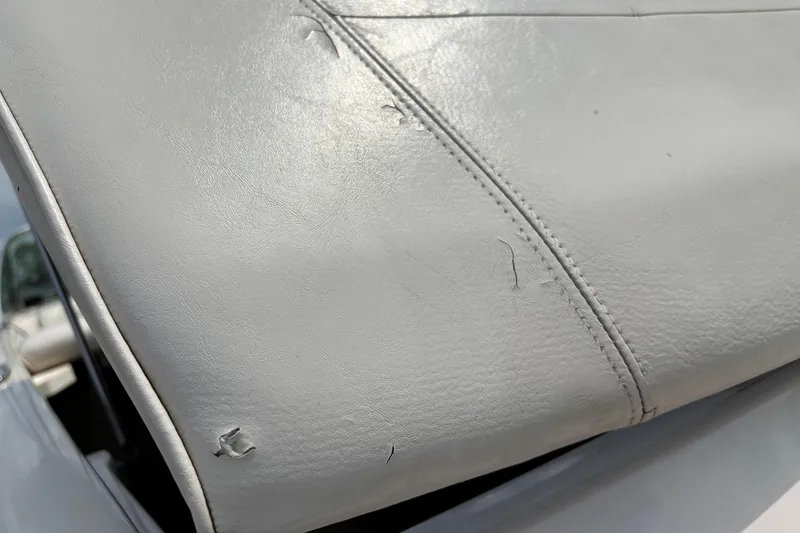 Slide: The Image of Close-up of worn upholstery on 1999 MasterCraft 205 PRO STAR boat. - 15