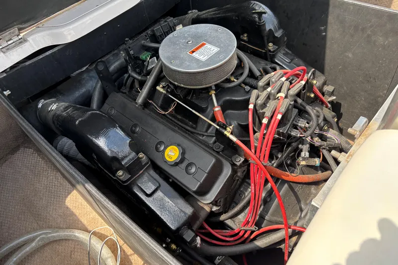 Slide: The Image of 1999 MasterCraft 205 PRO STAR engine compartment with visible wiring and components. - 11