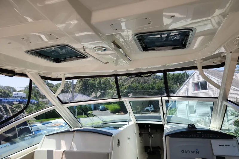 Slide: The Image of Interior view of 2018 Boston Whaler 320 Vantage boat with Garmin navigation system. - 17