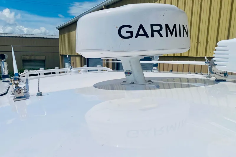 Slide: The Image of Garmin radar mounted on top of t-top - 12