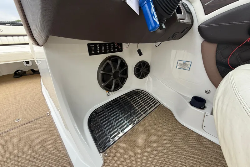 Slide: The Image of Interior of 2013 Cobalt A28 boat showing speakers and control panel. - 20