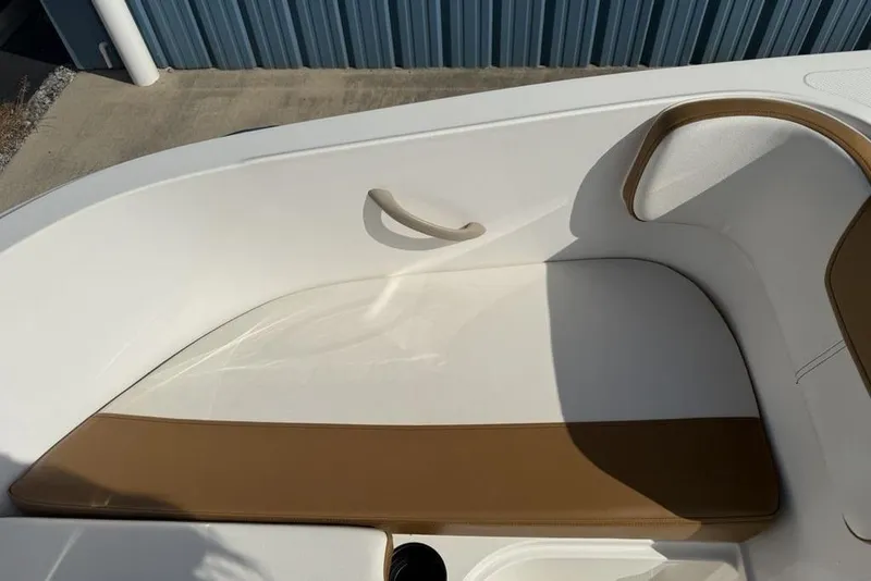 Slide: The Image of 2020 Bayliner VR4 Bowrider interior with tan and white seating. - 11