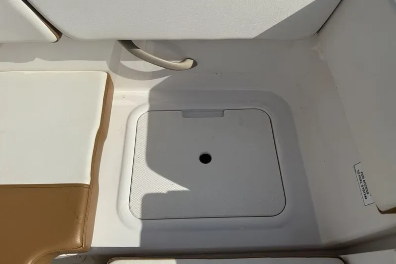 Slide: The Image of 2020 Bayliner VR4 Bowrider storage compartment with cushioned seating. - 23