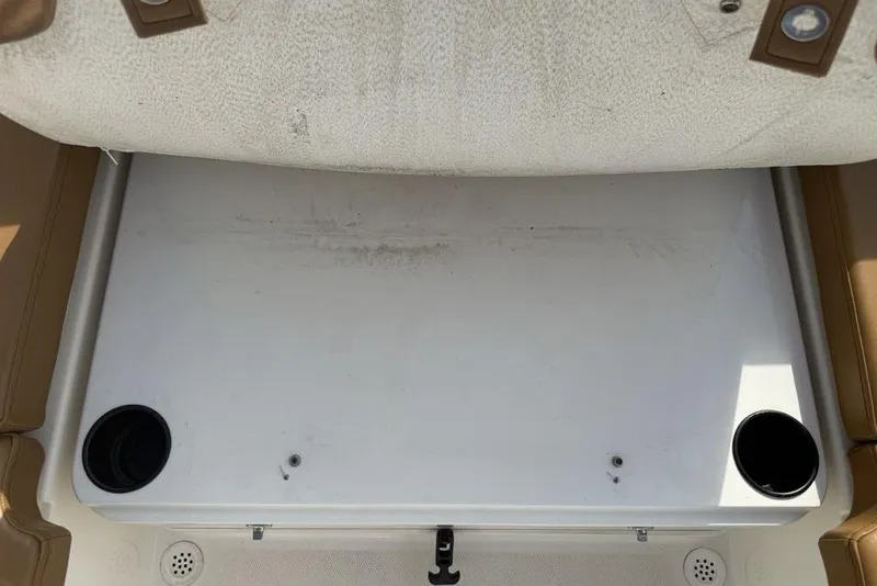 Slide: The Image of 2020 Bayliner VR4 Bowrider interior with cup holders and seating area. - 27