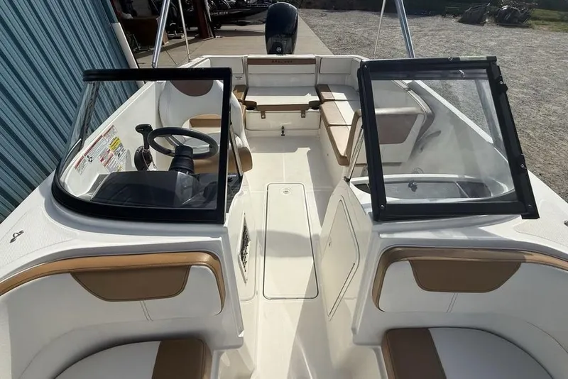 Slide: The Image of 2020 Bayliner VR4 Bowrider interior with dual consoles and seating. - 30