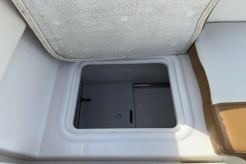 Slide: The Image of Open storage compartment in 2020 Bayliner VR4 Bowrider boat. - 32