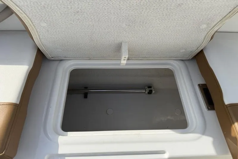 Slide: The Image of Open storage compartment in 2020 Bayliner VR4 Bowrider boat. - 33