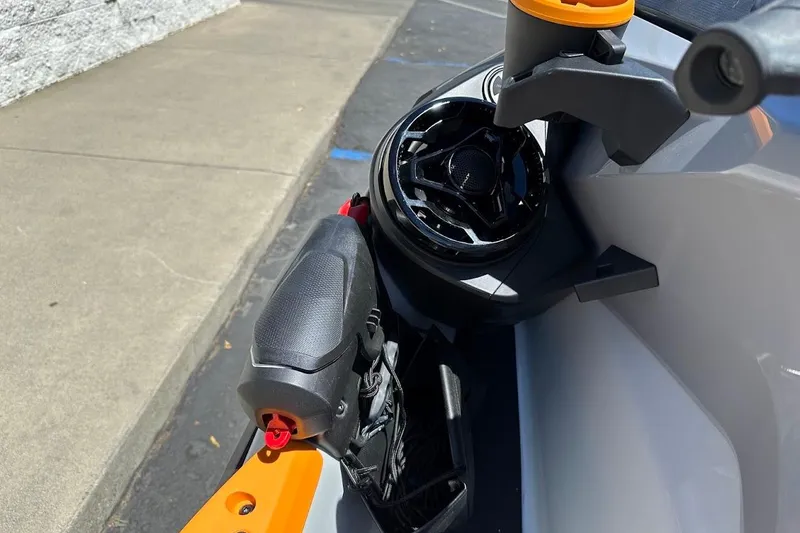 Slide: The Image of 2023 Sea-Doo Fish Pro Trophy handlebar and speaker detail in sunlight. - 10