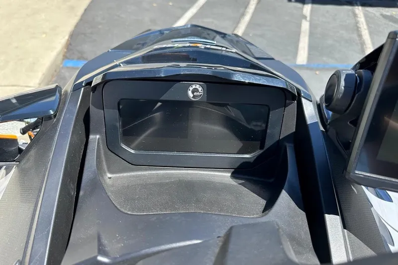 Slide: The Image of 2023 Sea-Doo Fish Pro Trophy dashboard, close-up view in sunlight. - 15