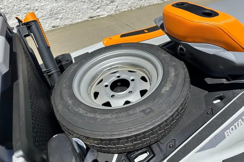 Slide: The Image of 2023 Sea-Doo Fish Pro Trophy with spare tire on deck. - 19