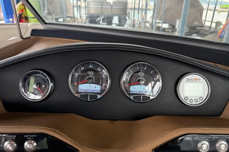 Slide: The Image of Dashboard of 2016 Cobalt R5 WSS Surf boat with gauges and controls. - 19