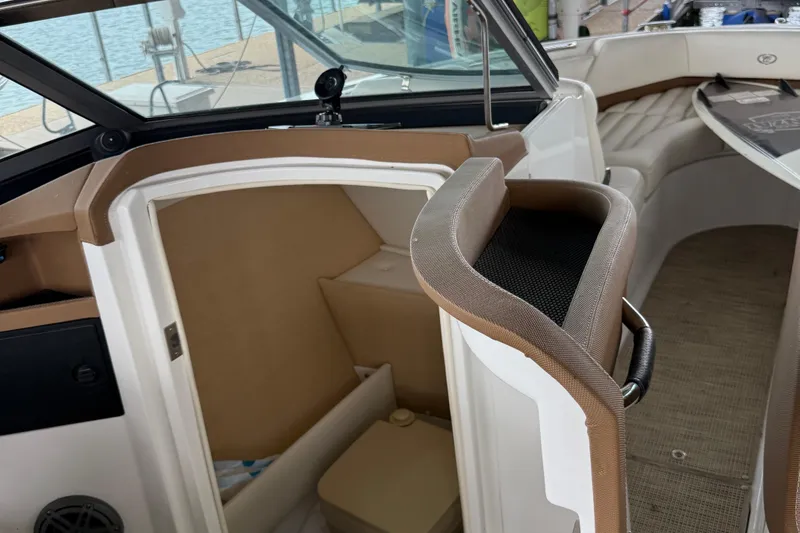 Slide: The Image of 2016 Cobalt R5 WSS Surf boat interior with seating and storage area. - 6