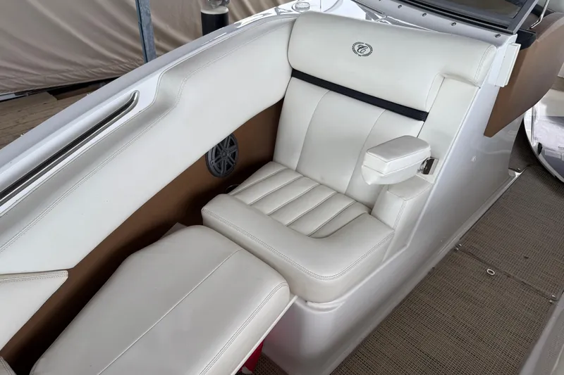 Slide: The Image of 2016 Cobalt R5 WSS Surf boat interior with white leather seating. - 7