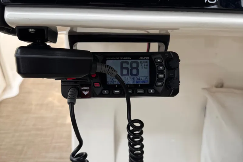 Slide: The Image of Marine radio on a 2020 Sea Ray boat, displaying channel 68. - 12