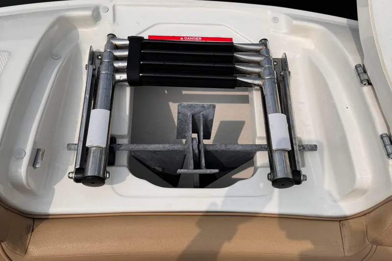 Slide: The Image of 2020 Sea Ray boat with a folded stainless steel ladder and anchor storage. - 18