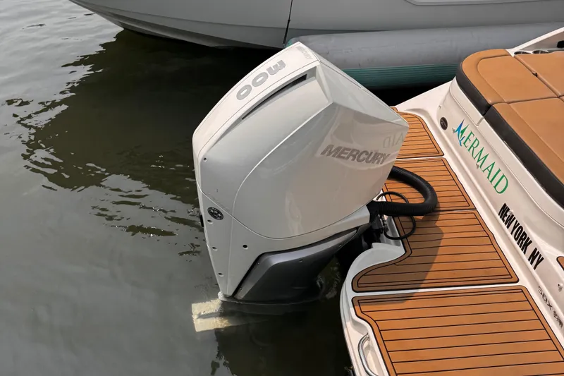 Slide: The Image of 2020 Sea Ray boat with Mercury outboard motor, docked in New York. - 33