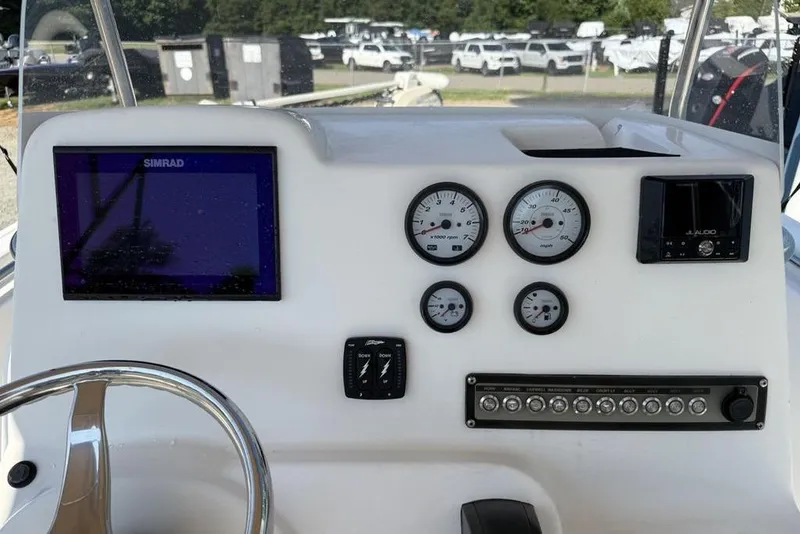 Slide: The Image of Control panel of 2020 Tidewater 198 CC Adventure boat with gauges and electronics. - 12