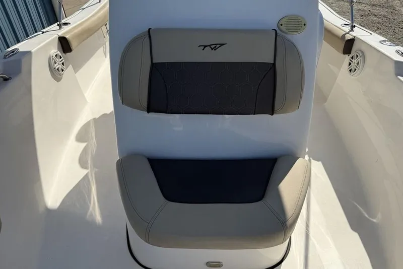 Slide: The Image of 2020 Tidewater 198 CC Adventure boat seat with beige and black upholstery. - 14