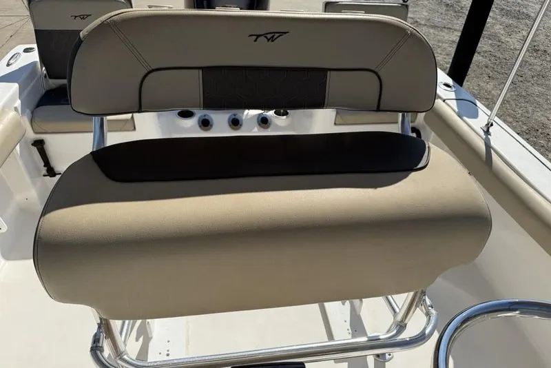Slide: The Image of 2020 Tidewater 198 CC Adventure boat seat with beige upholstery and stainless steel frame. - 17