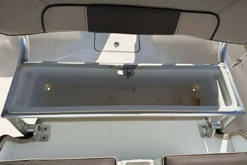 Slide: The Image of Open storage compartment on 2020 Tidewater 198 CC Adventure boat. - 19