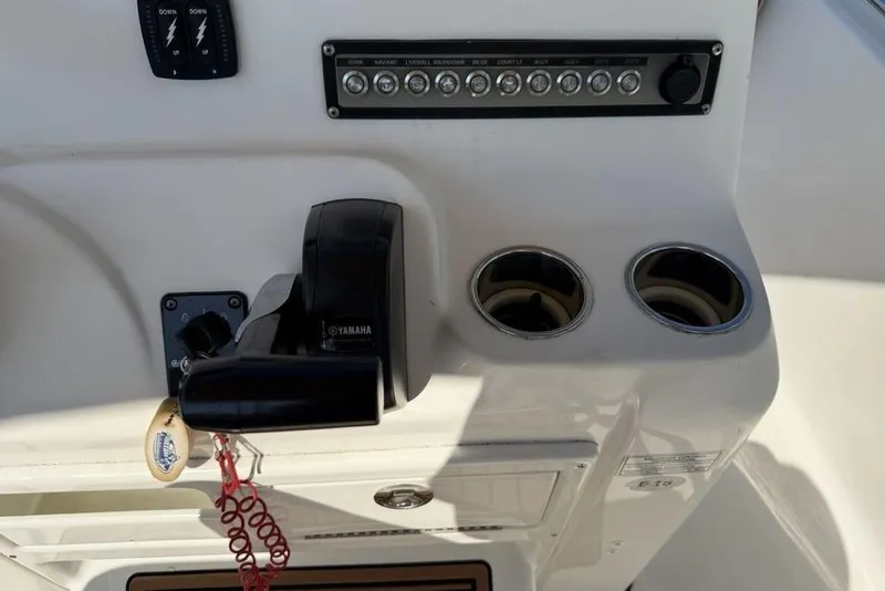 Slide: The Image of 2020 Tidewater 198 CC Adventure boat console with Yamaha controls and cup holders. - 25