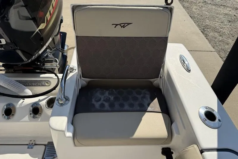 Slide: The Image of 2020 Tidewater 198 CC Adventure boat seat and motor detail in sunlight. - 29