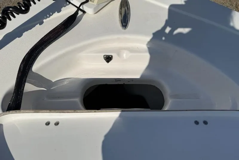 Slide: The Image of 2020 Tidewater 198 CC Adventure boat interior detail with storage compartment. - 4