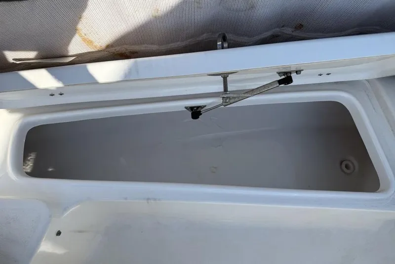 Slide: The Image of Open storage compartment on 2020 Tidewater 198 CC Adventure boat. - 7