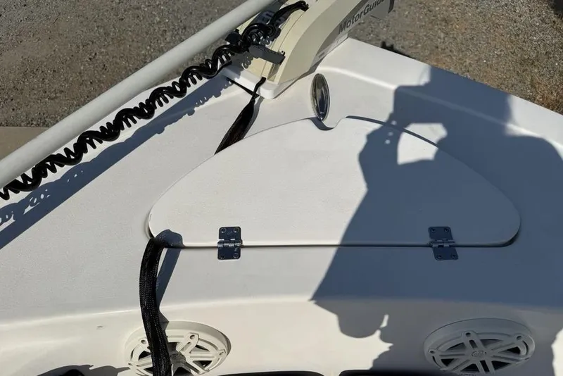 Slide: The Image of 2020 Tidewater 198 CC Adventure boat deck with trolling motor and storage hatch. - 8