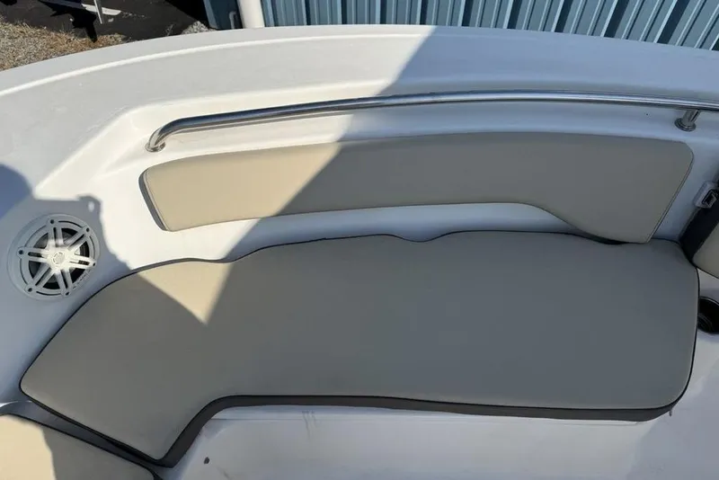 Slide: The Image of 2020 Tidewater 198 CC Adventure boat interior seating with speaker and rail. - 9