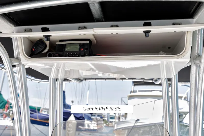 Slide: The Image of 2016 Robalo R222 Center Console with Garmin VHF radio installed. - 13