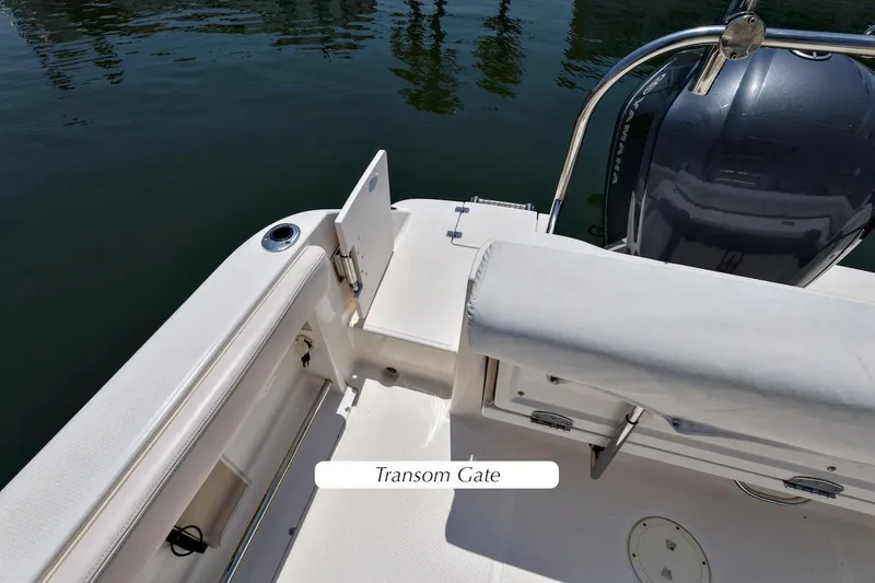 Slide: The Image of 2016 Robalo R222 Center Console boat with transom gate and Yamaha engine. - 17