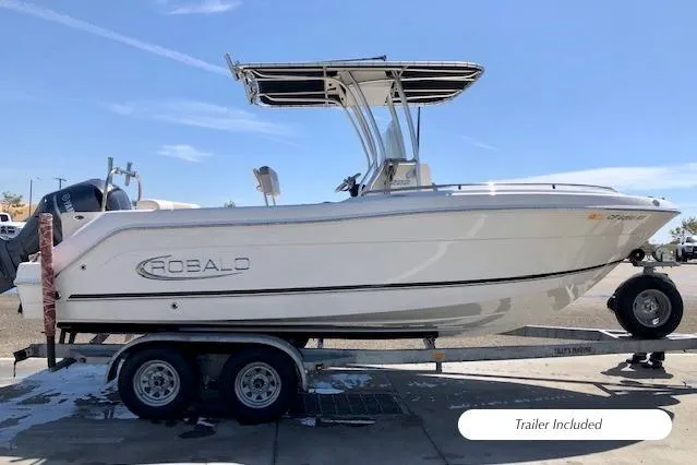 Slide: The Image of 2016 Robalo R222 Center Console boat on trailer, side view, sunny day. - 20