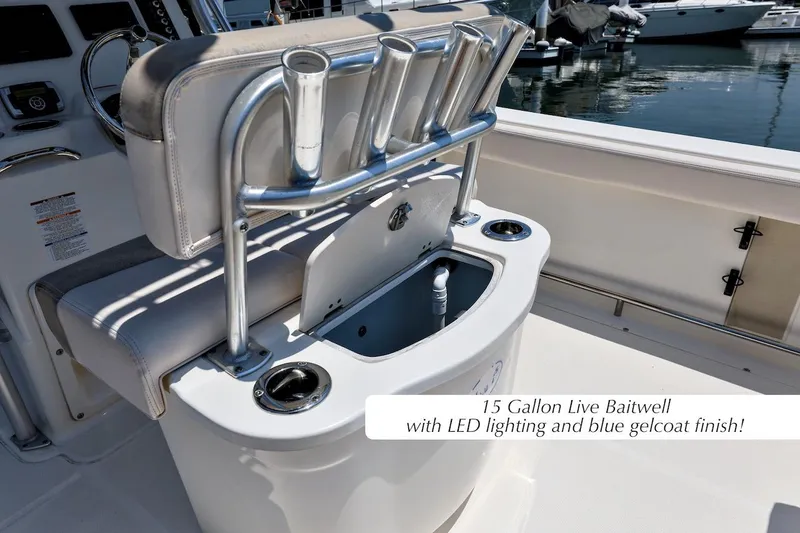 Slide: The Image of 2016 Robalo R222 Center Console with 15-gallon live baitwell, LED lighting, and blue gelcoat finish. - 7