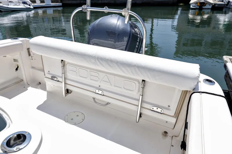 Slide: The Image of 2016 Robalo R222 Center Console boat with Yamaha engine, docked in marina. - 8